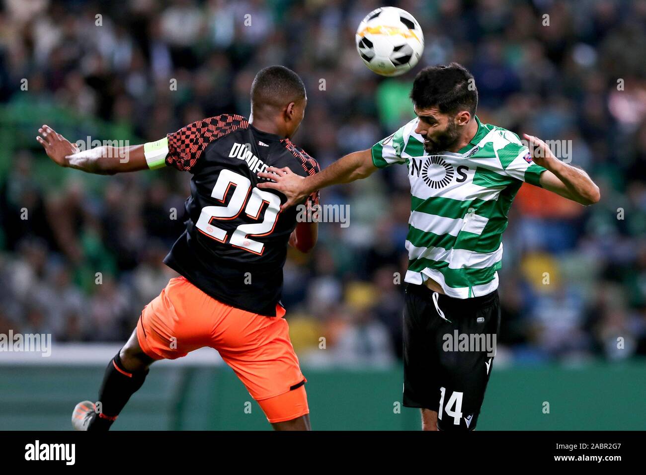 Lisbon, Portugal. 28th Nov, 2019. Luis Neto (R) of Sporting CP vies with Denzel Dumfries of PSV Eindhoven during the UEFA Europa League Group D football match at Alvalade stadium in Lisbon, Portugal, on Nov. 28, 2019. Sporting CP won 4-0. Credit: Pedro Fiuza/Xinhua/Alamy Live News Stock Photo