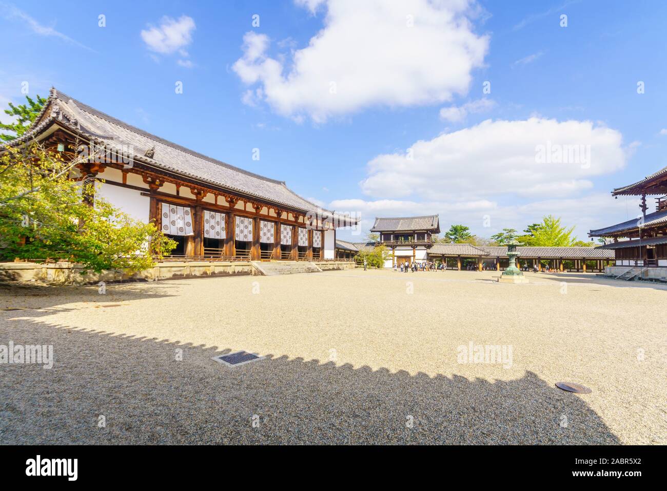 Ikaruga, Japan - October 5, 2019: View of the Horyu-ji compound, with visitors, it is a Buddhist temple in Ikaruga, Nara prefecture, Japan Stock Photo