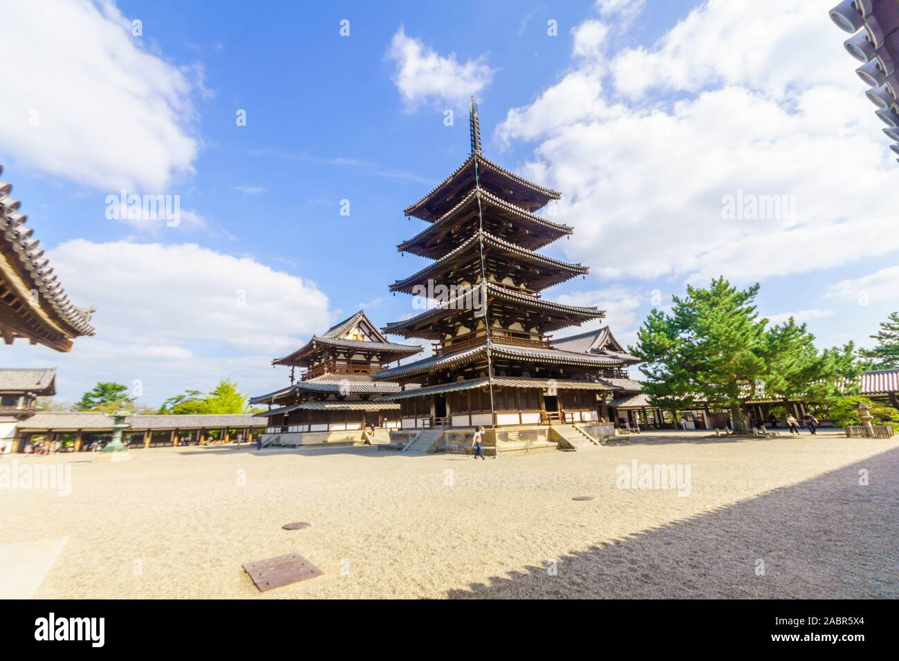 Ikaruga, Japan - October 5, 2019: View of the Horyu-ji compound and pagoda, with visitors, it is a Buddhist temple in Ikaruga, Nara prefecture, Japan Stock Photo