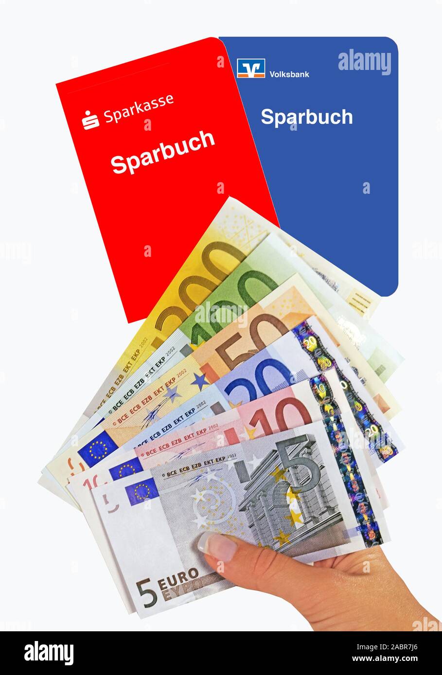 Sparbuch der Sparkasse und Volksbank, Hand mit Euro-Banknoten Stock Photo