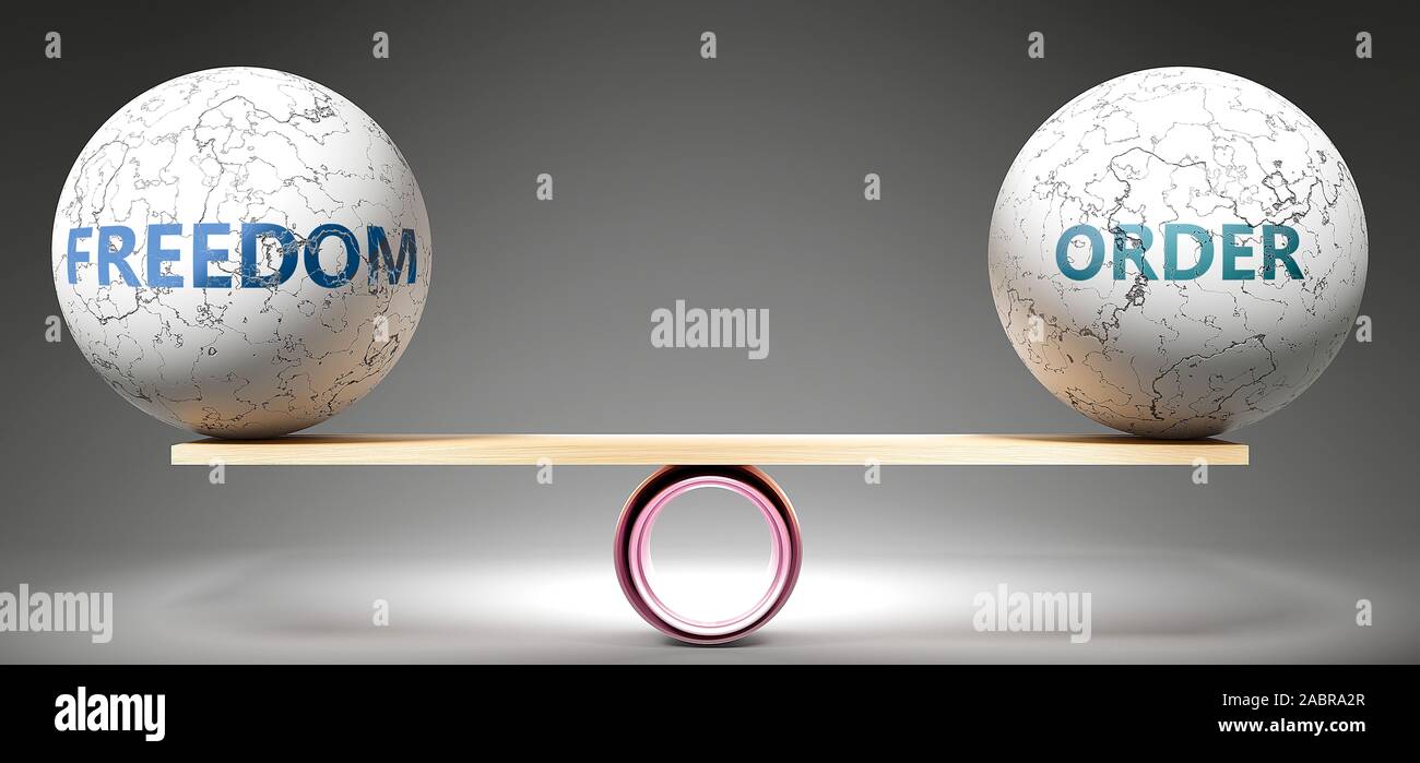 Freedom Order Freedom and order in balance - pictured as balanced balls on scale that ...
