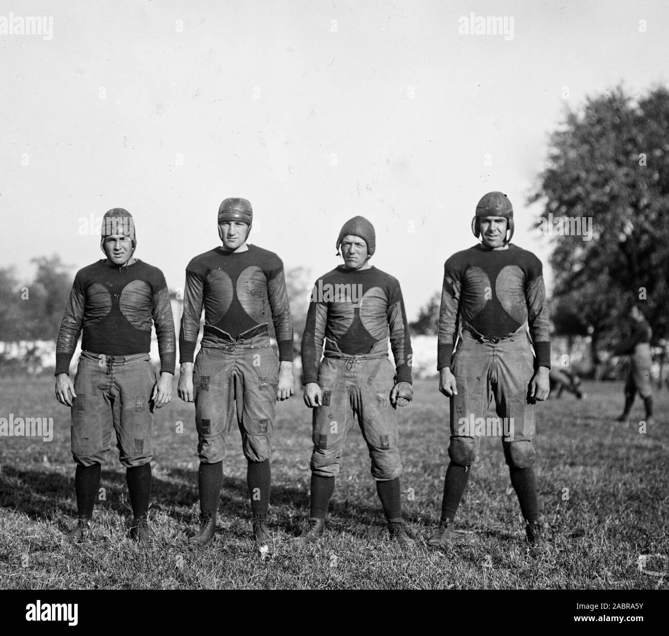 Early 1900s American football players pose for a photo ca. 1922 Stock