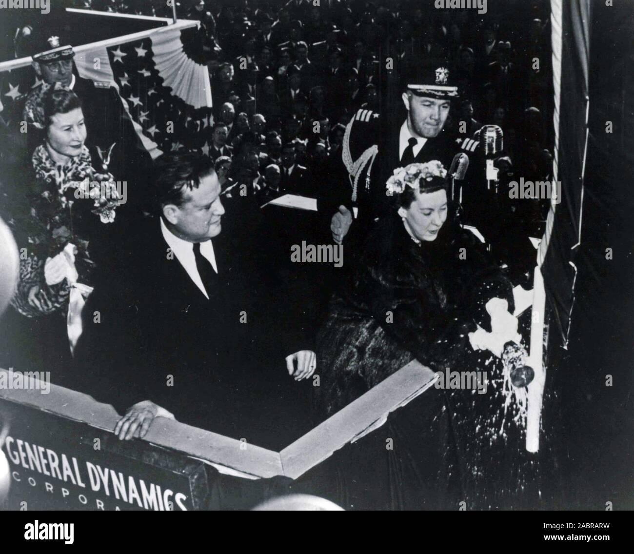 In this file photo taken Jan. 21, 1954, first lady Mamie Eisenhower christens the nuclear-powered submarine USS Nautilus (SSN 571). Stock Photo