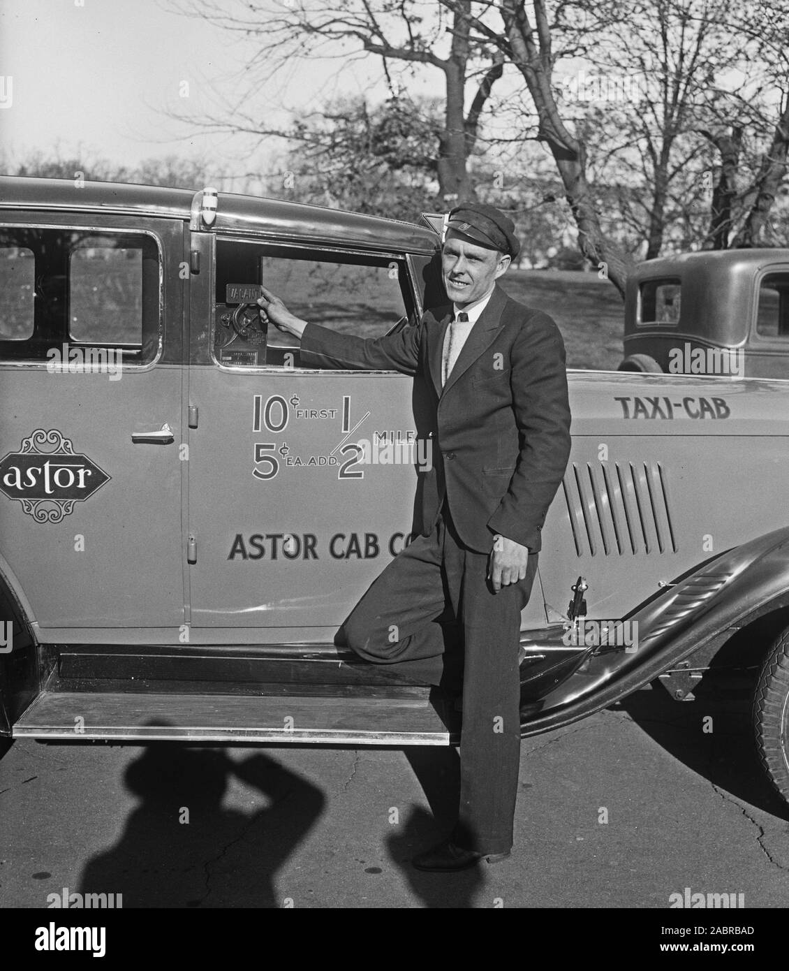 Taxi cab driver with his Astor cab ca. 1932 or 1933 Stock Photo Alamy