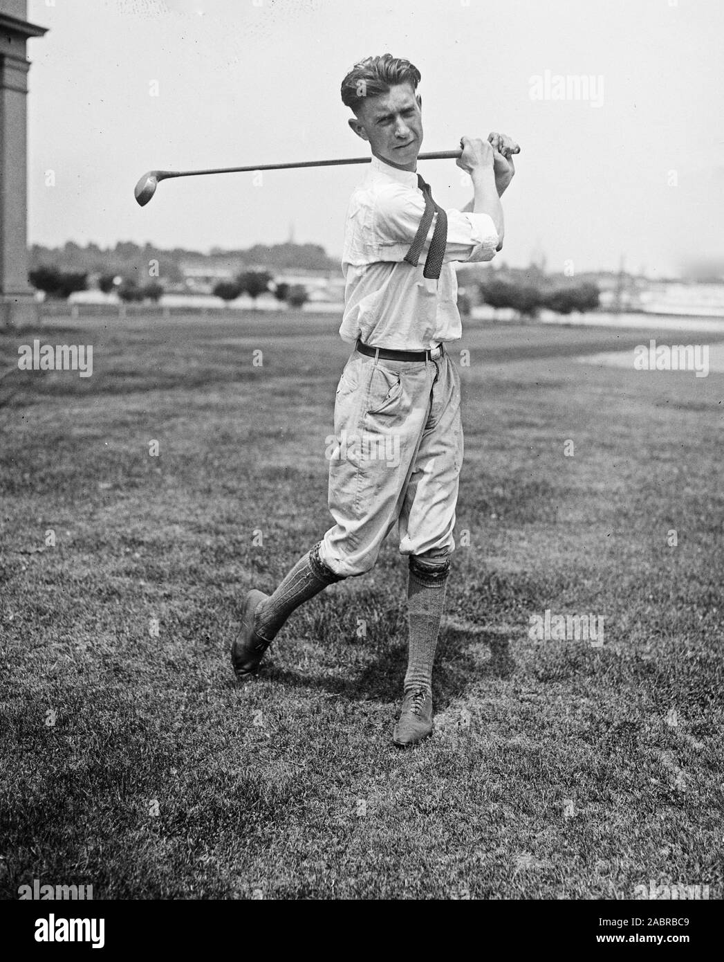 Vintage Golfing - Man playing golf in 1923 Stock Photo