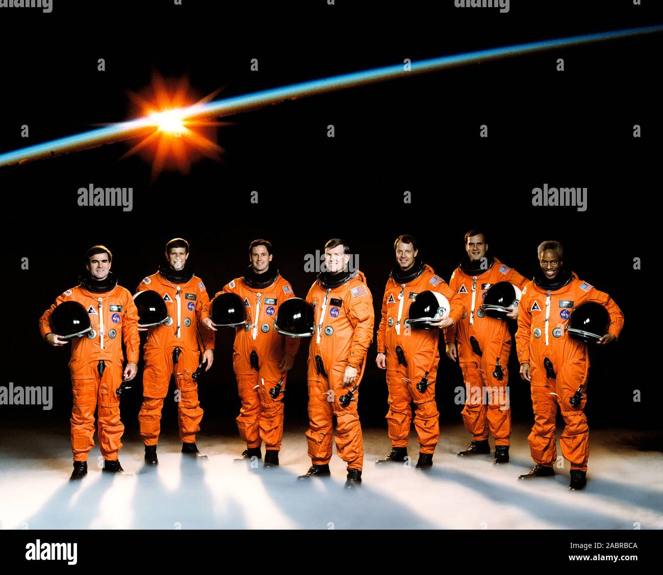 (December 1990) --- NASA's STS-39 crew members, wearing their partial pressure launch and entry suits, pose for traditional portrait. Left to right are astronauts Charles L. (Lacy) Veach, Donald R. McMonagle, Gregory J. Harbaugh, Michael L. Coats, L. Blaine Hammond Jr., Richard J. Hieb and Guion S. Bluford Jr. Coats is mission commander; Hammond, pilot, and the others are mission specialists. Stock Photo