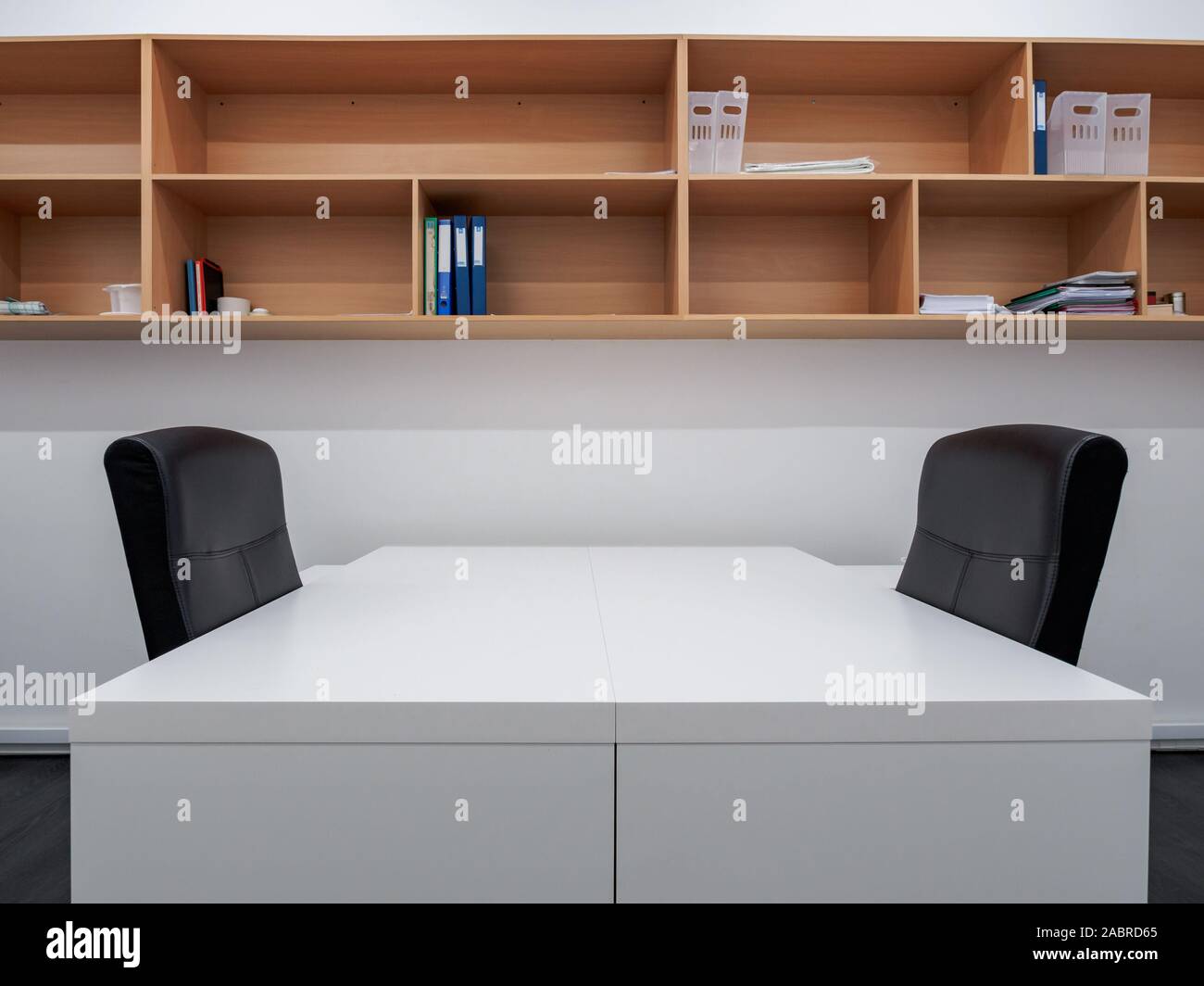 Small Office Interior With Wooden Shelving Stock Photo Alamy