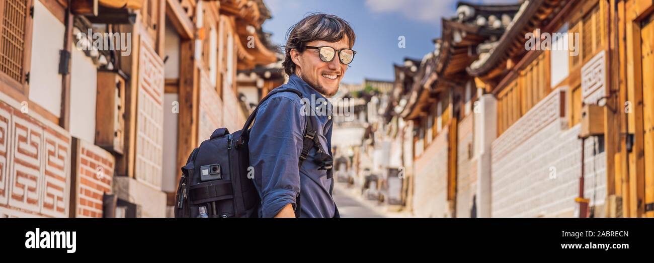 Young man tourist in Bukchon Hanok Village is one of the famous place ...