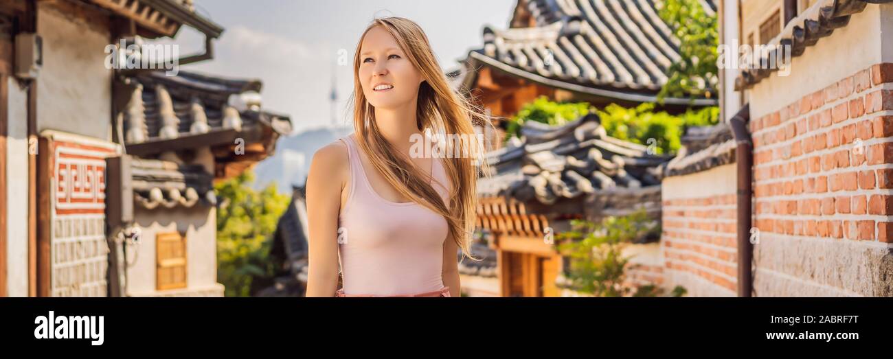 Young woman tourist in Bukchon Hanok Village is one of the famous place ...
