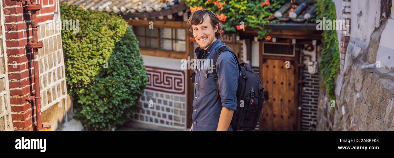 Young man tourist in Bukchon Hanok Village is one of the famous place ...