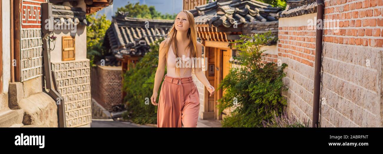 Young woman tourist in Bukchon Hanok Village is one of the famous place ...
