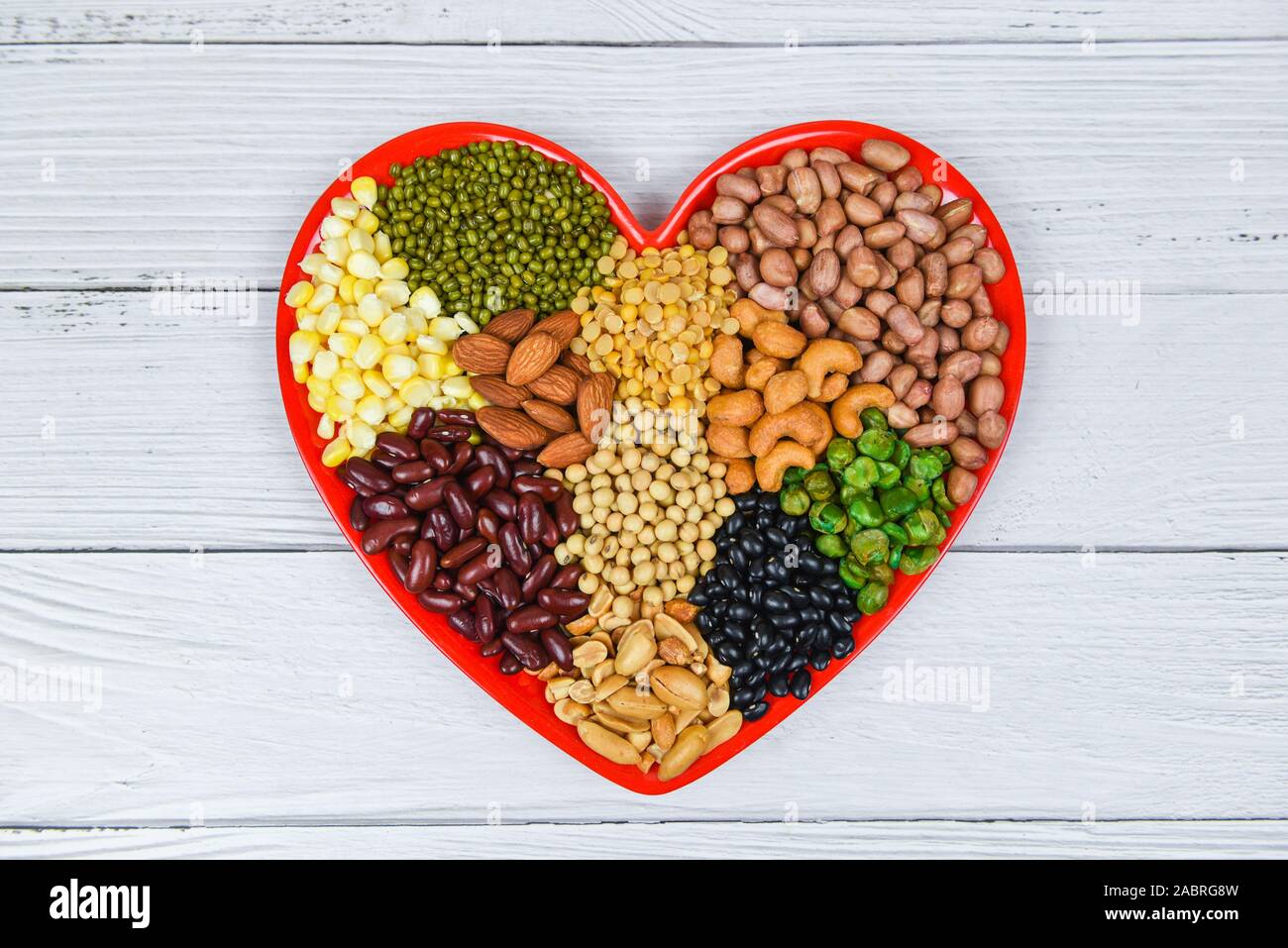 Set of different whole grains beans and legumes seeds lentils and nuts