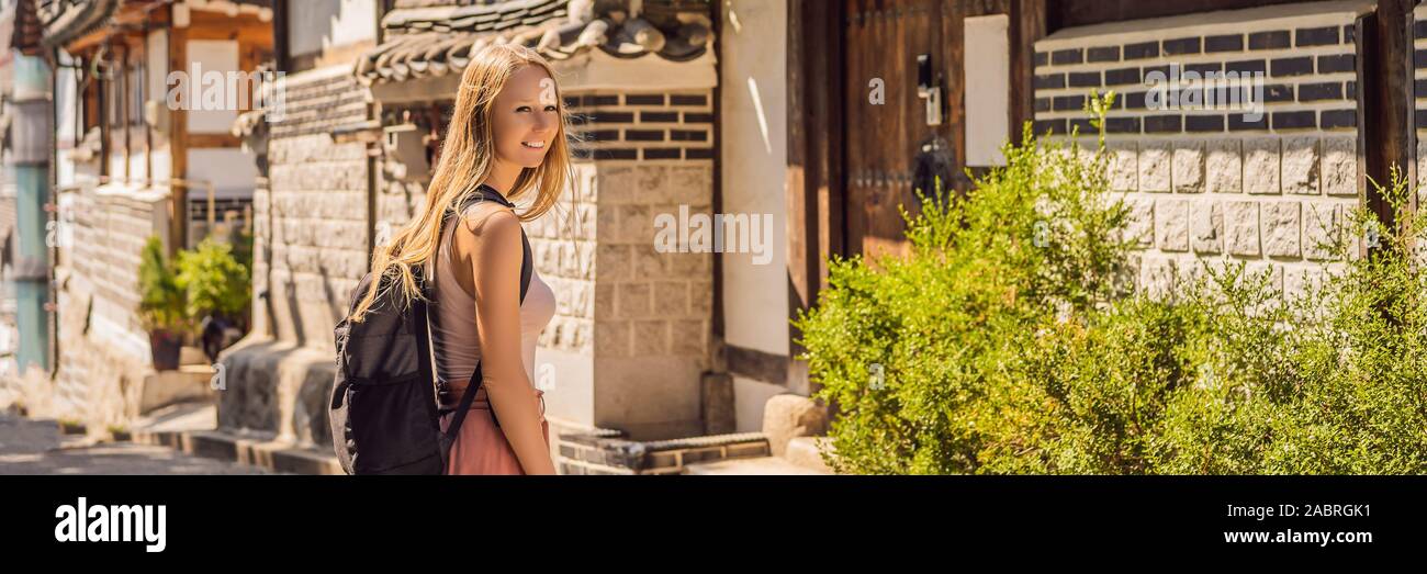 Young woman tourist in Bukchon Hanok Village is one of the famous place ...