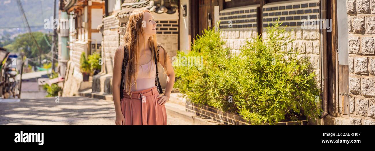 Young woman tourist in Bukchon Hanok Village is one of the famous place ...