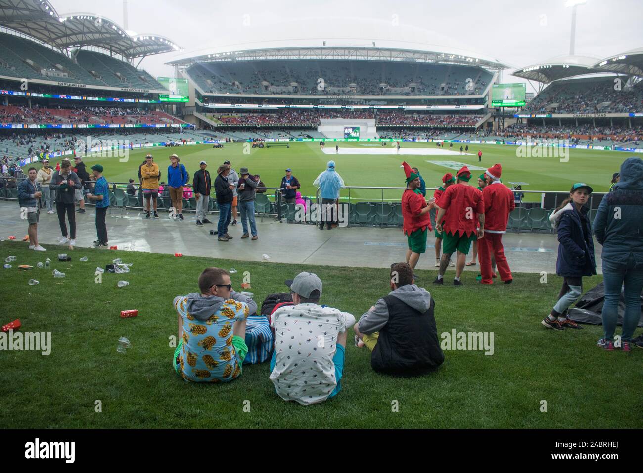 Adelaide, Australia 29 November 2019. Cricket fans during a rain delay on the opening day of  the 2nd Domain Day Night test between Australia and Pakistan at the Adelaide Oval. Australia leads 1-0 in the 2 match series .Credit: amer ghazzal/Alamy Live News Stock Photo