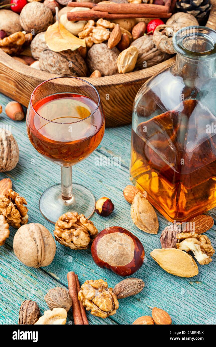Aromatic alcohol from nuts.Nut liquor.Tincture on nuts.Italian liquor.Nut flavoring Stock Photo
