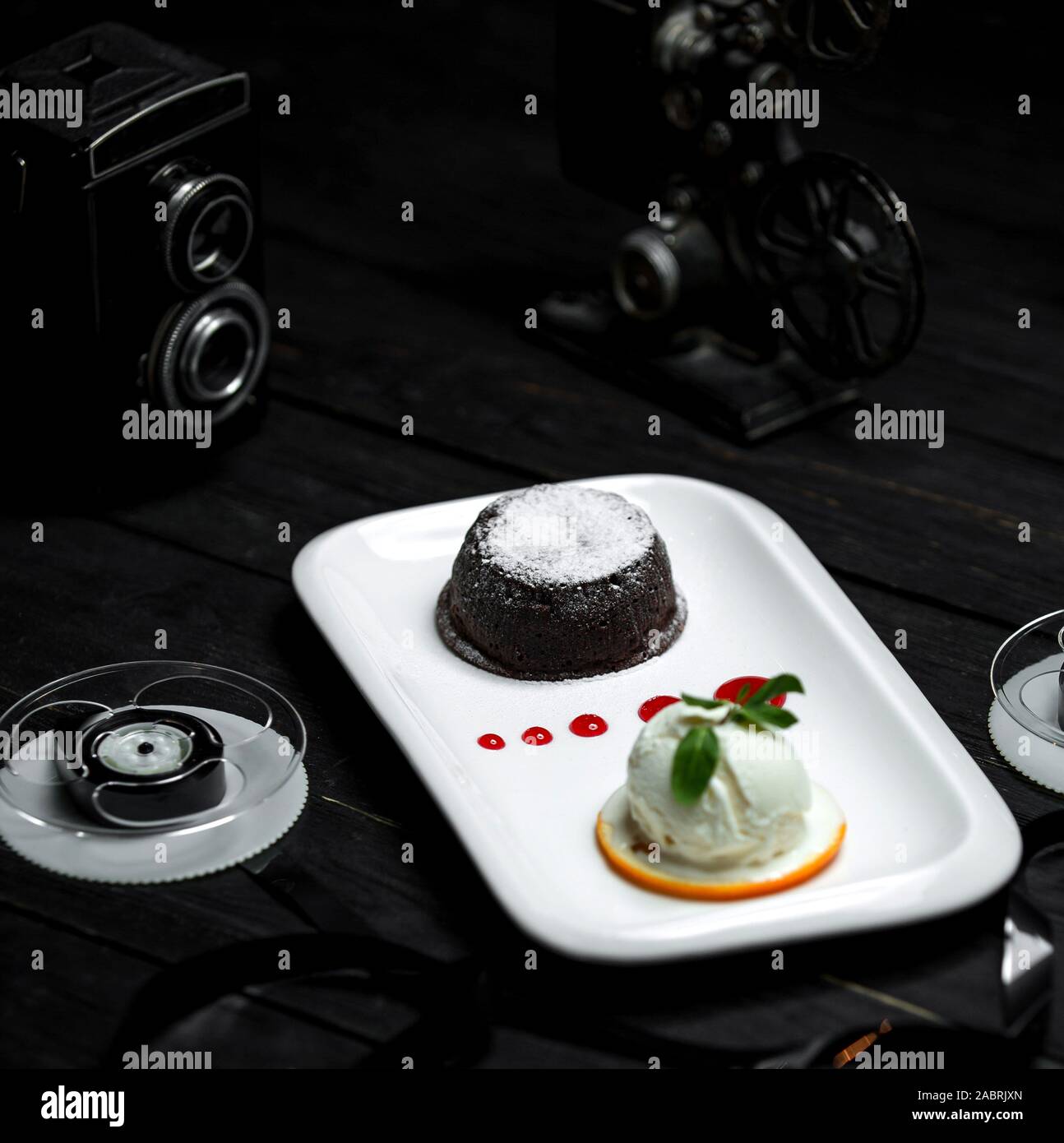 chocolate volcano and a scoop of white ice cream Stock Photo Alamy