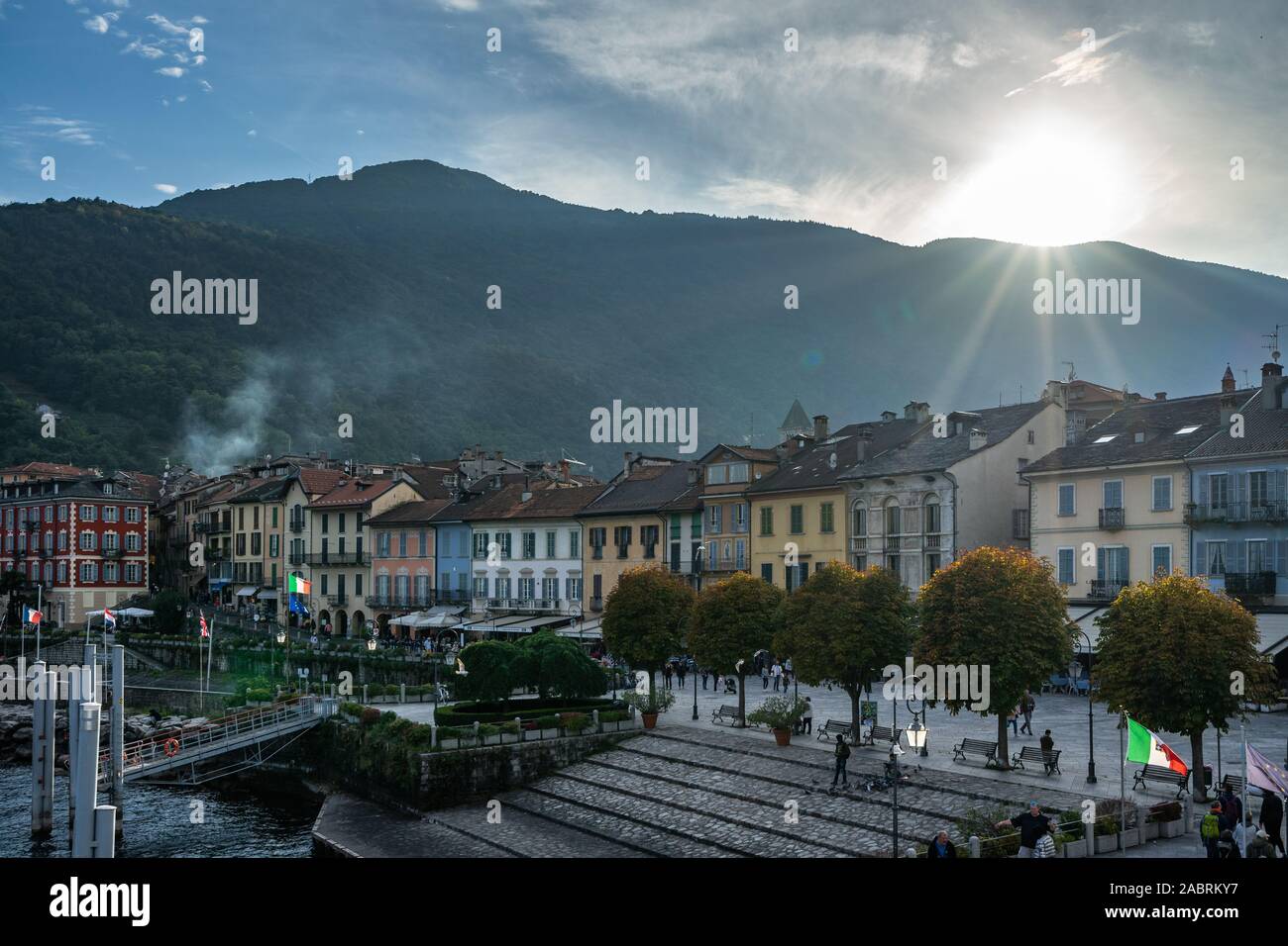 Scenic view of Cannobio lakefront promenade at sunset. Cannobio is pretty resort town on the Lake Maggiore. Cannobio, Piedmont, Italy, October 2019 Stock Photo