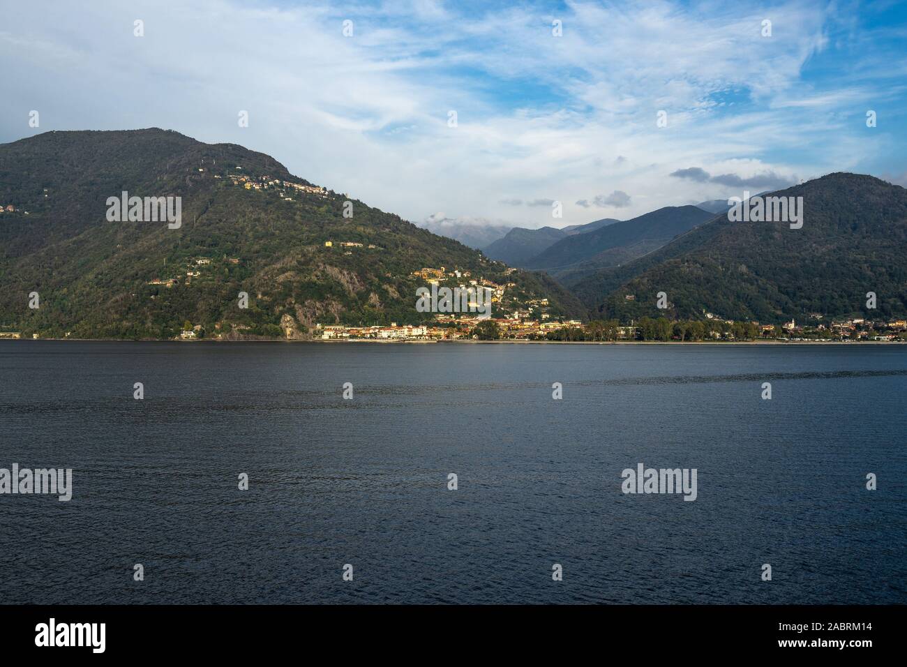 Landscape of Lago Maggiore at sunset from a ferry boat cruising on the lake, Italy Stock Photo