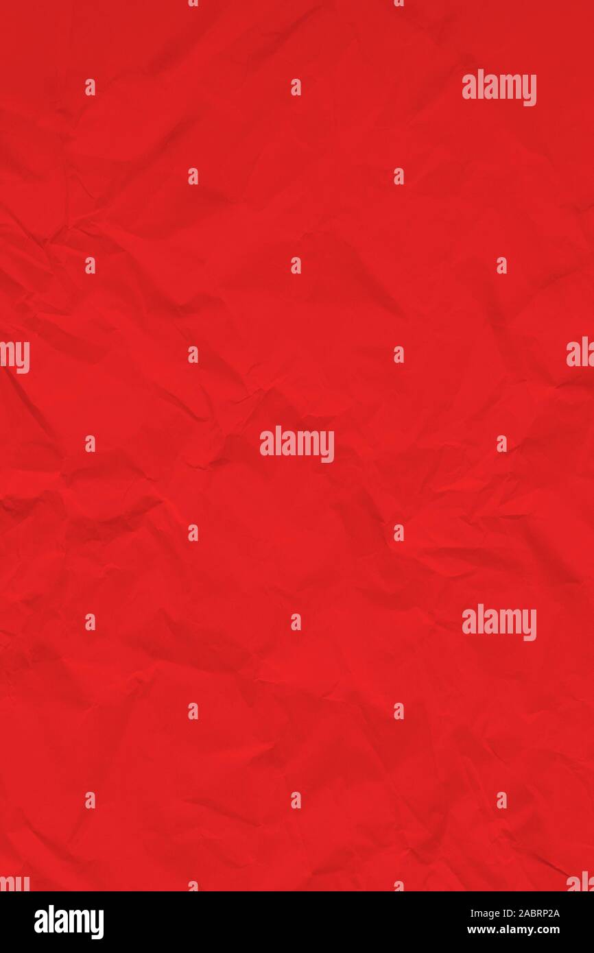 Red crumpled wrinkled textured paper background. Empty space Stock Photo