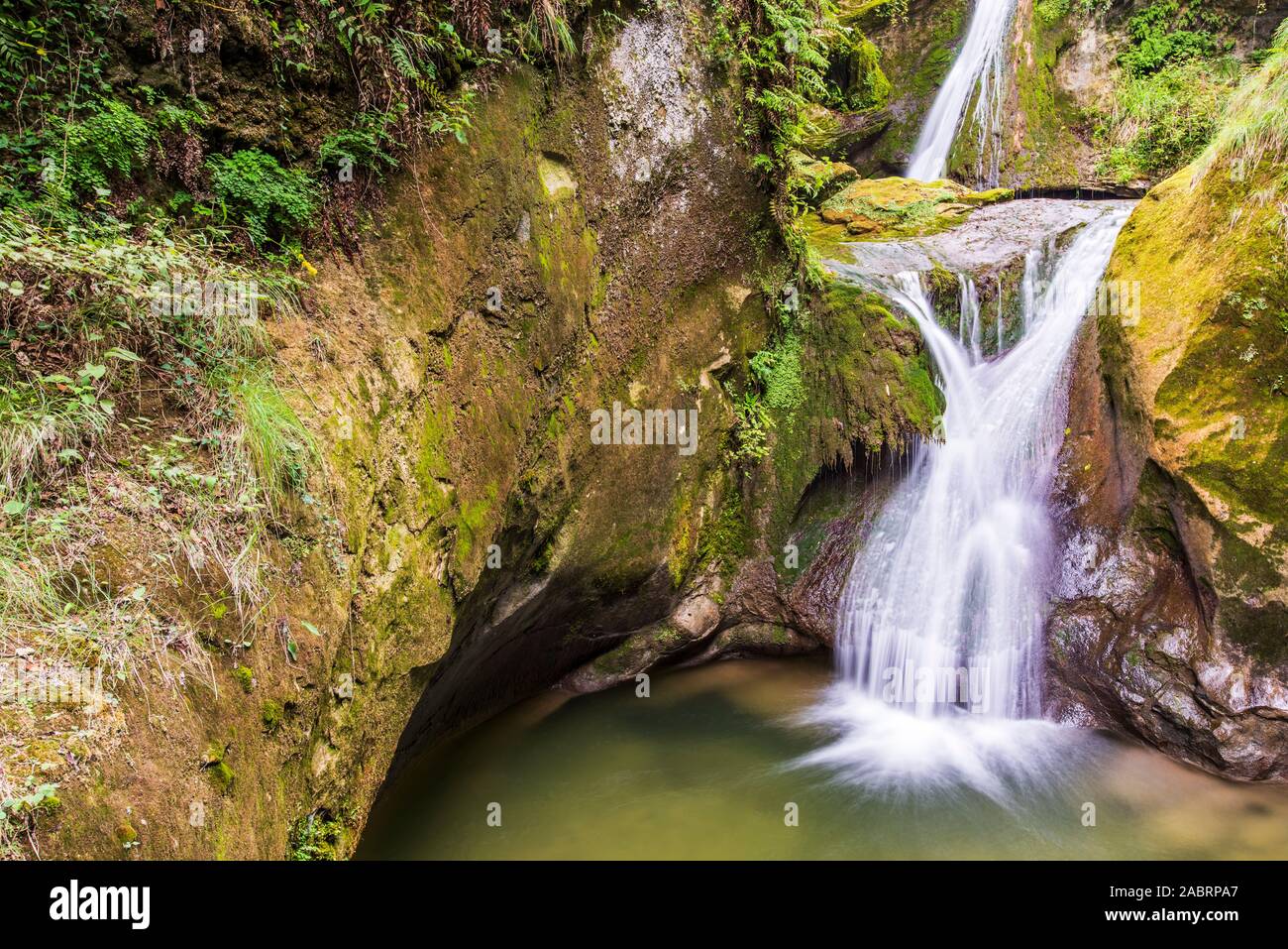 Caglieron caves and waterfalls. Emerald colored magic Stock Photo - Alamy