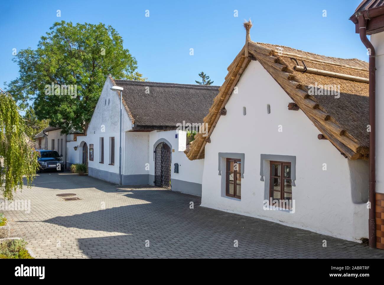 idyllic scenery with traditional houses in Apetlon, a town in a area named Burgenland in Austria Stock Photo