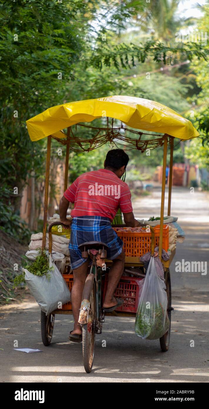 Back view of Mobile vendors selling fruit and vegetable's Stock Photo Alamy