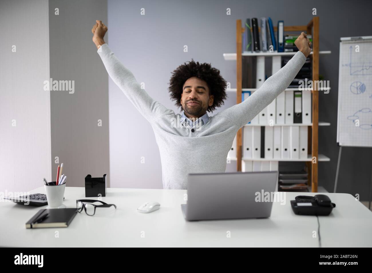 Man stretching arms african hi-res stock photography and images - Alamy