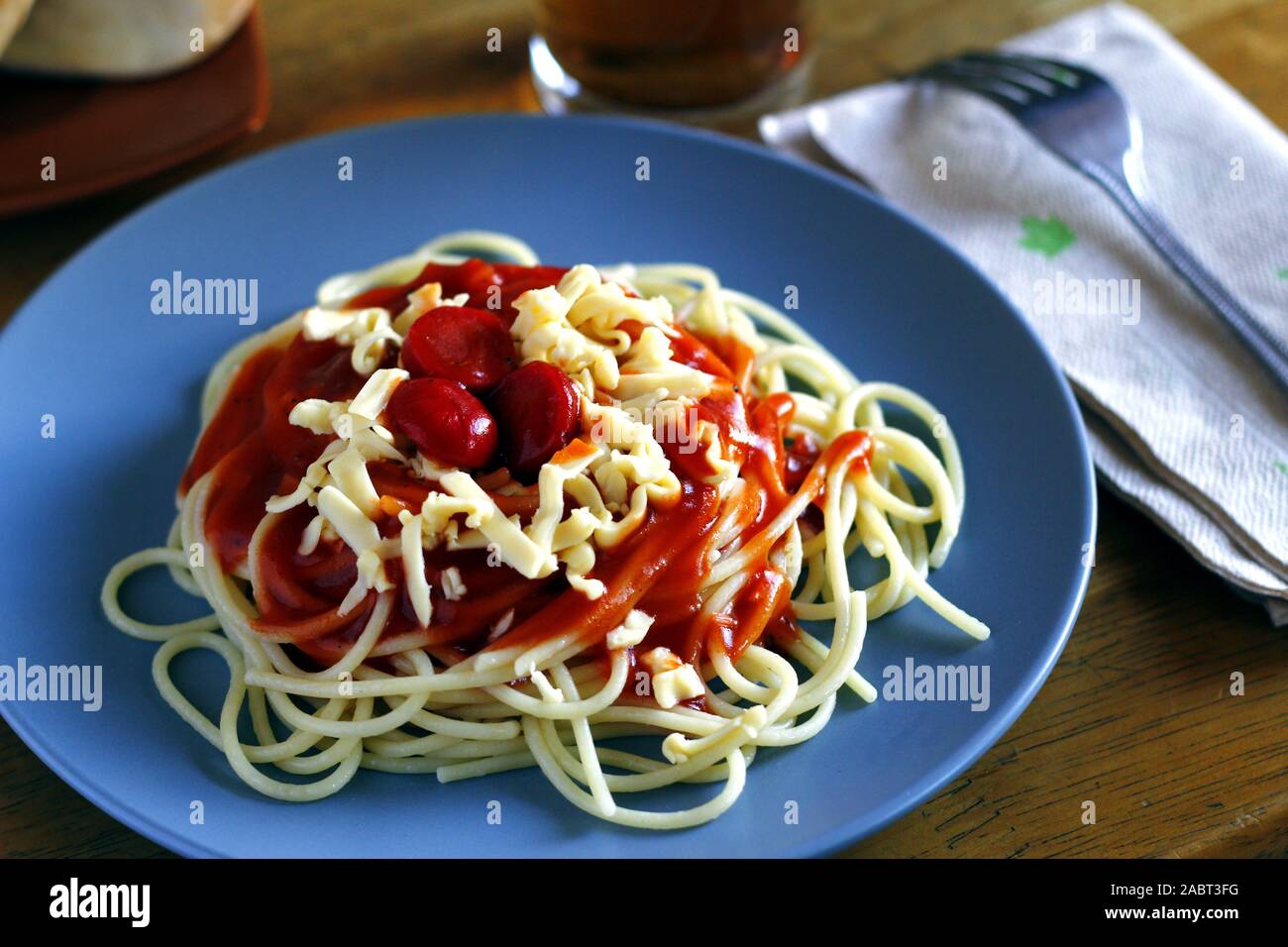 Photo Of Freshly Cooked Spaghetti Pasta With Tomato Sauce Topped With Cheese And Hotdog Stock Photo Alamy