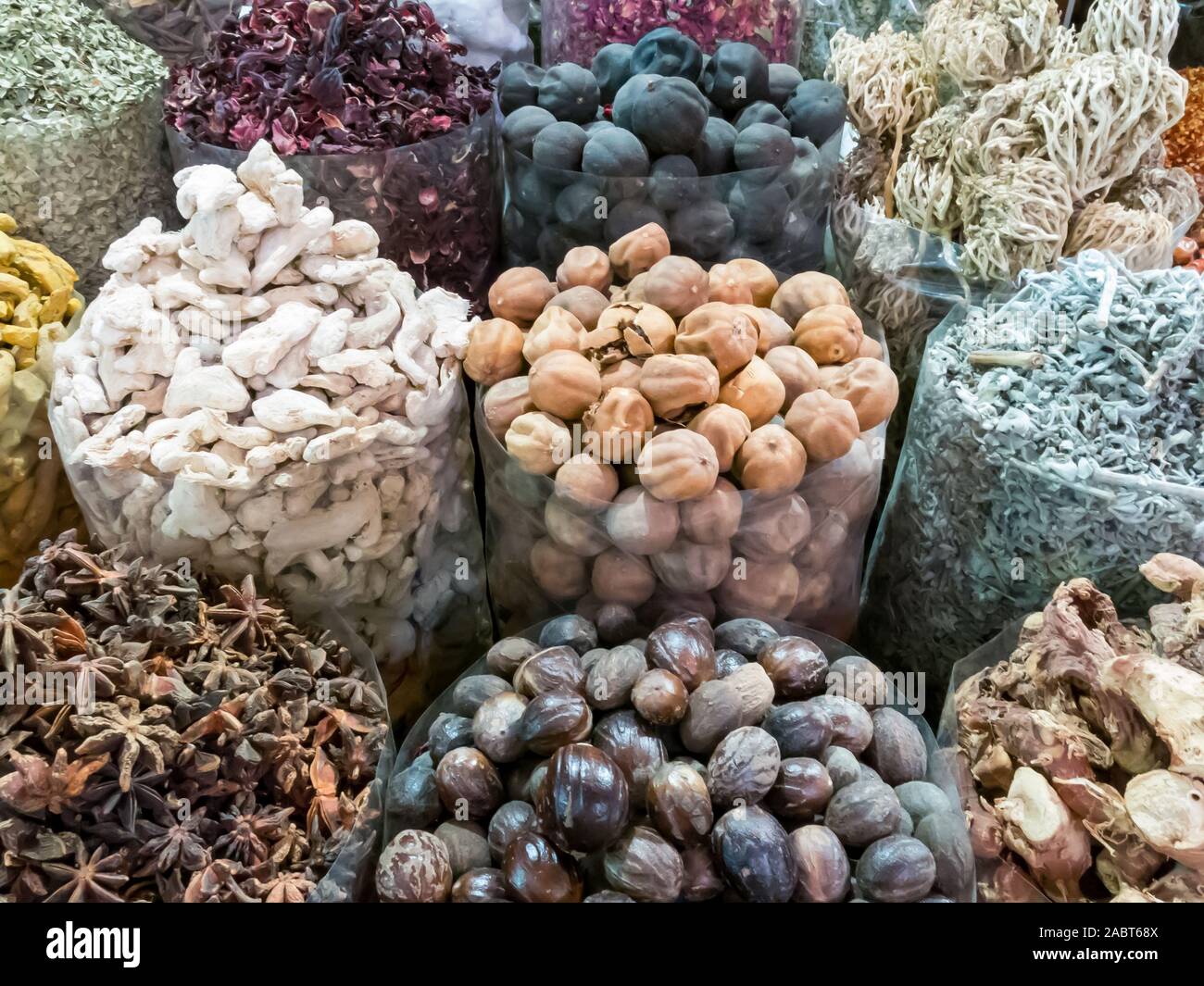 Assortment of spices displayed in bags in the famous Spice Souk in Deira area of Dubai, United Arab Emirates Stock Photo