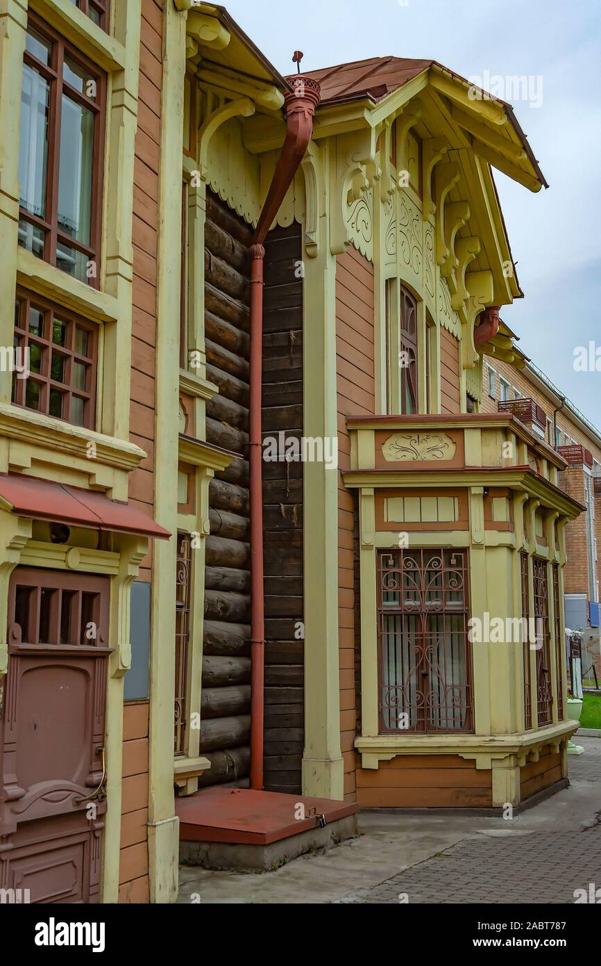 Krasnoyarsk, a fragment of the facade of an old wooden building, the former mansion Dmitriev Stock Photo