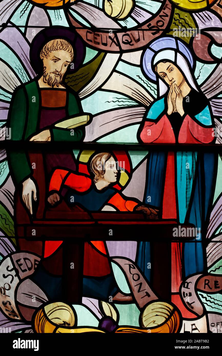 Saint Joseph des Fins church. Holy Family. Joseph the Carpenter. Stained glass window.  Annecy. France. Stock Photo