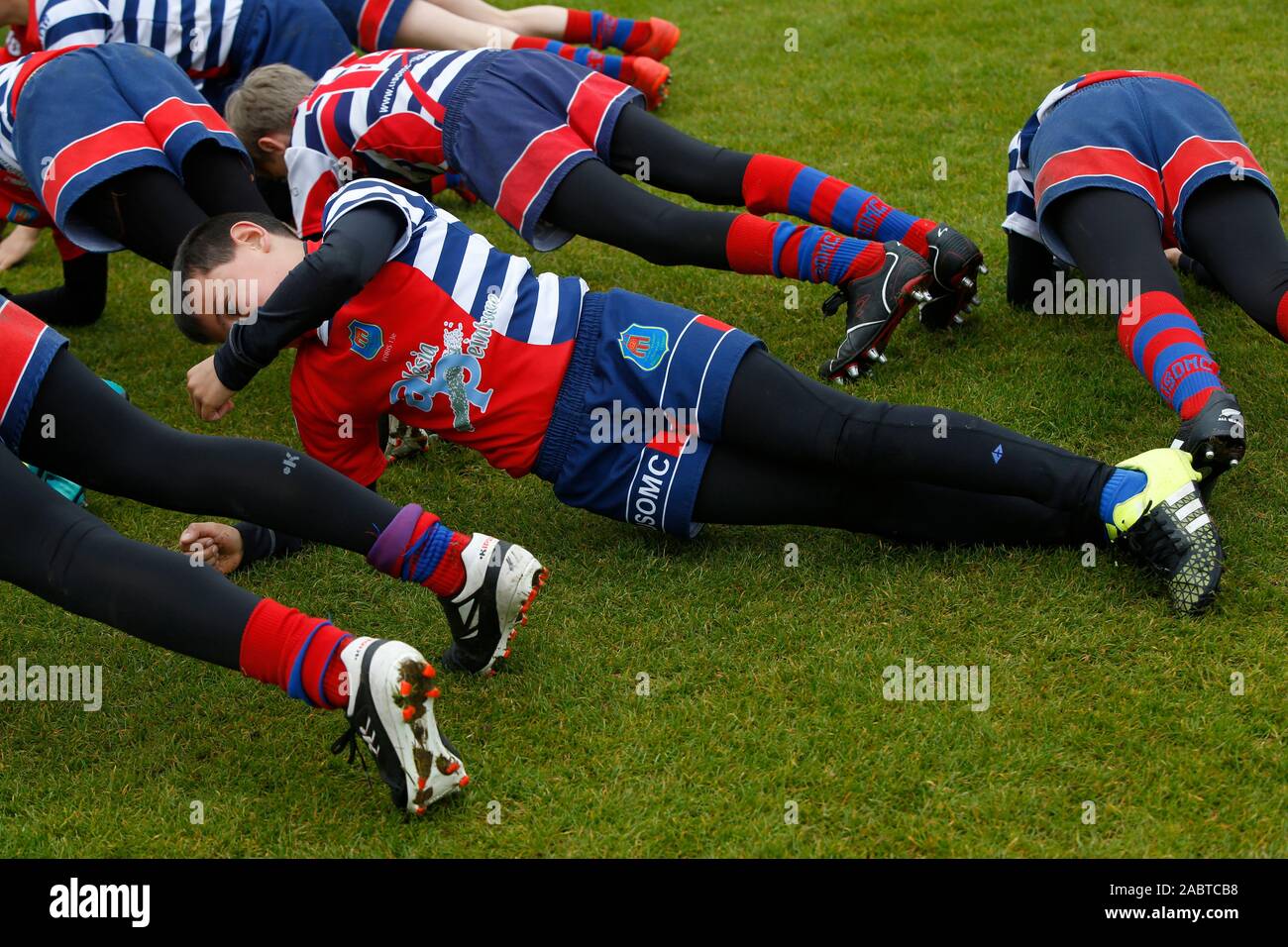Teenagers warming up before a rugby match in Hauts-de-Seine, France. Stock Photo