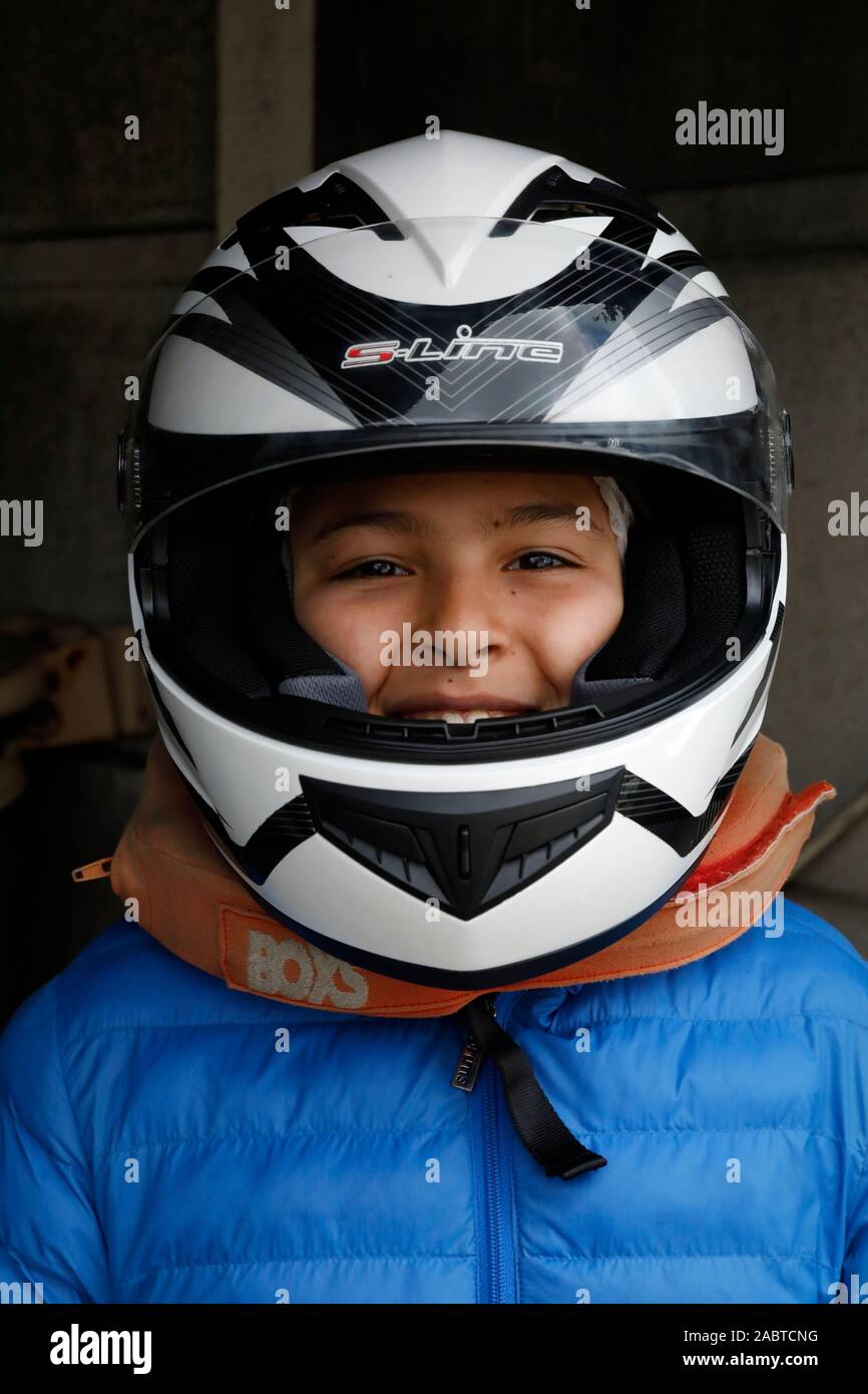 12 year old boy wearing a helmet in Cabourg France Stock Photo Alamy