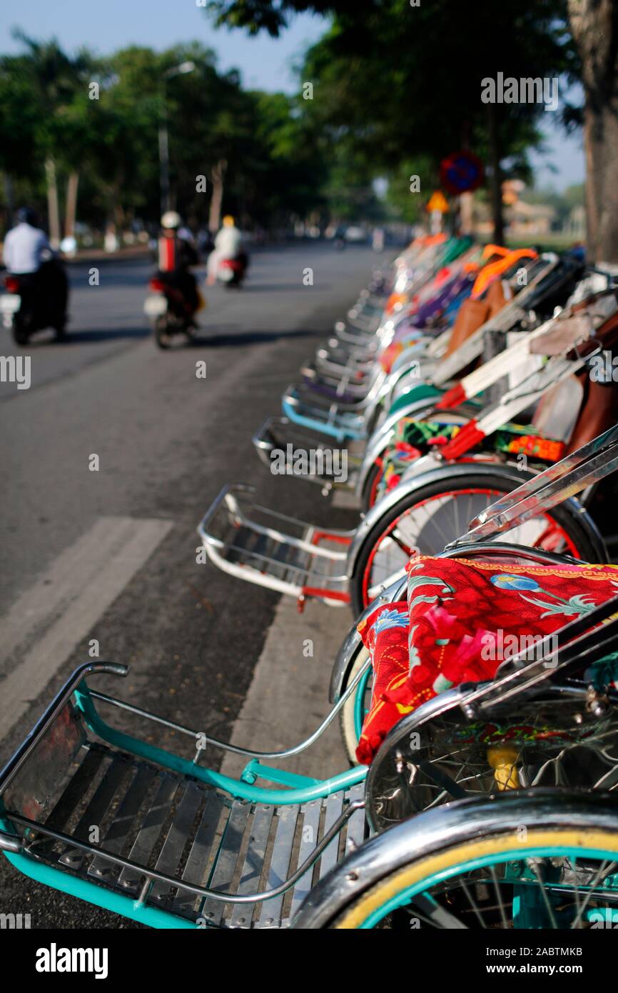 Cyulos Tradional vietnamese cylos on street waiting for customer. Hue. Vietnam ...
