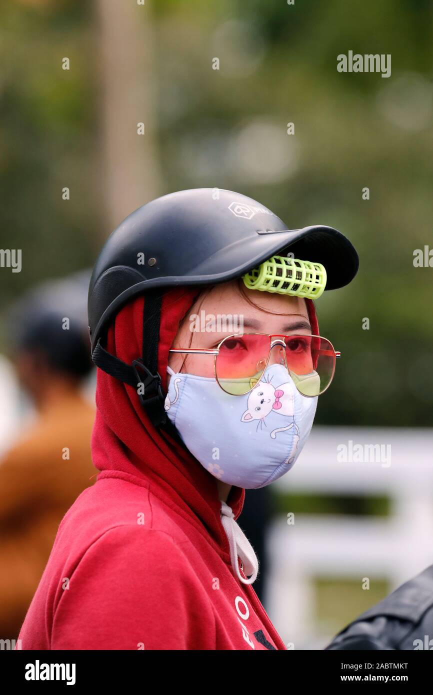 Woman riding a motorcycle.  Hue. Vietnam. Stock Photo