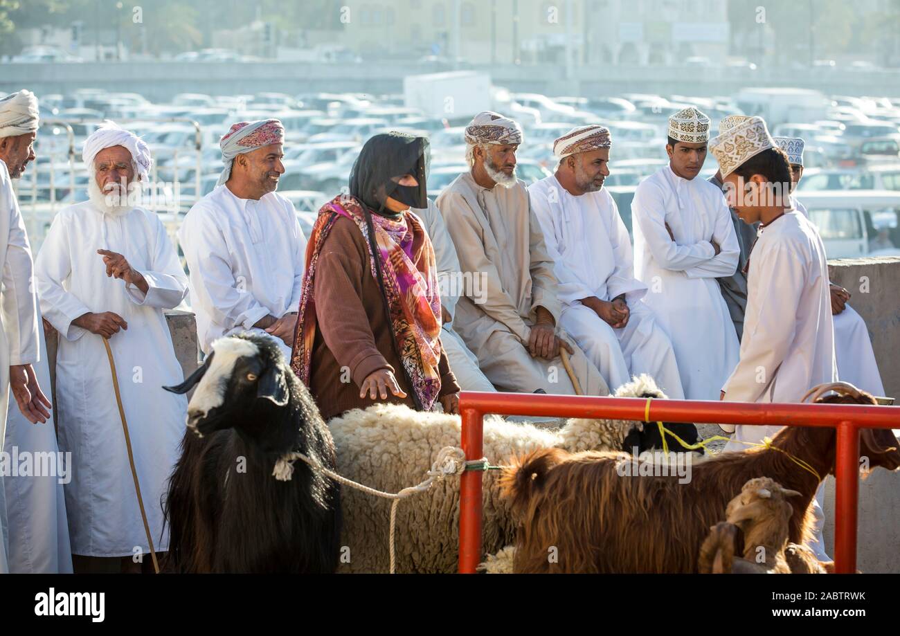 Nizwa, Oman, December 2015: omani people  at the old Nizwa goat market Stock Photo