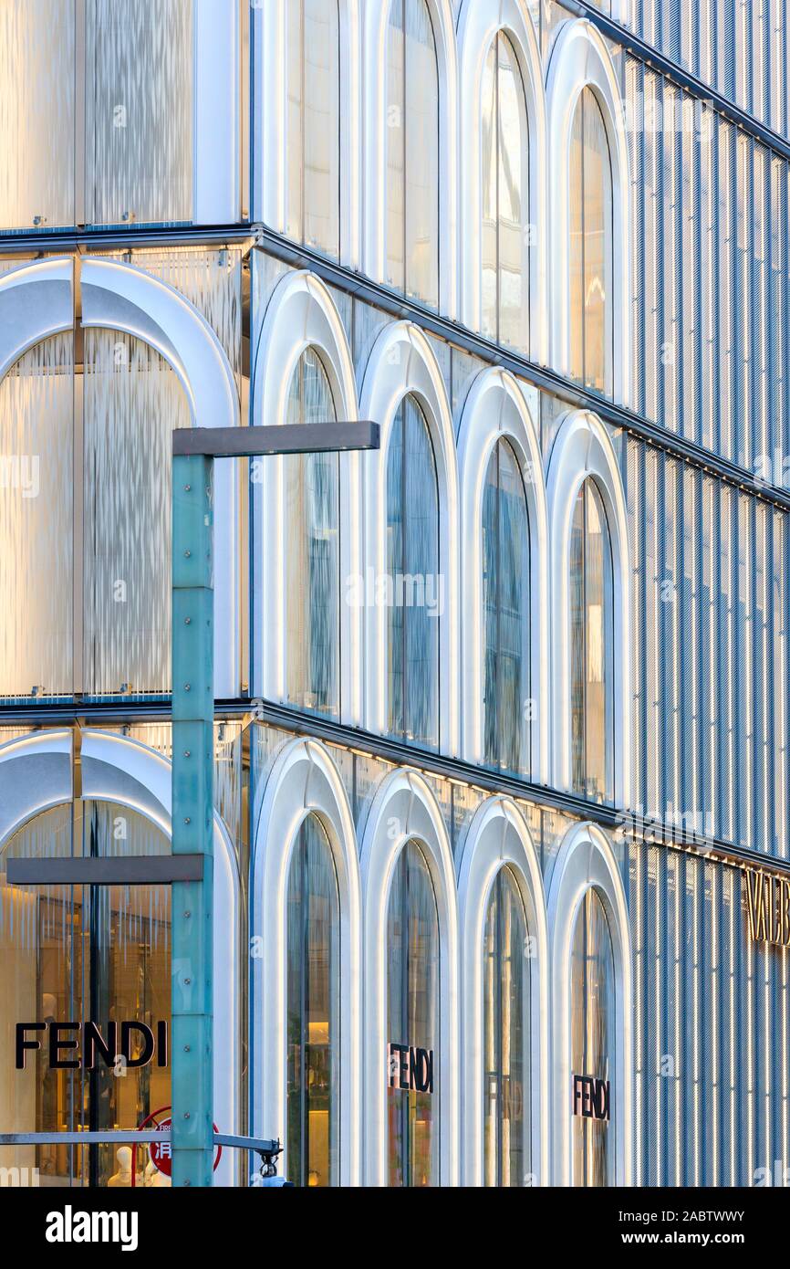 Tokyo, The Fendi Ginza store. Store facade with round arch and rectangular  windows with supporting framework. Red Fire Hydrant sign outside Stock  Photo - Alamy