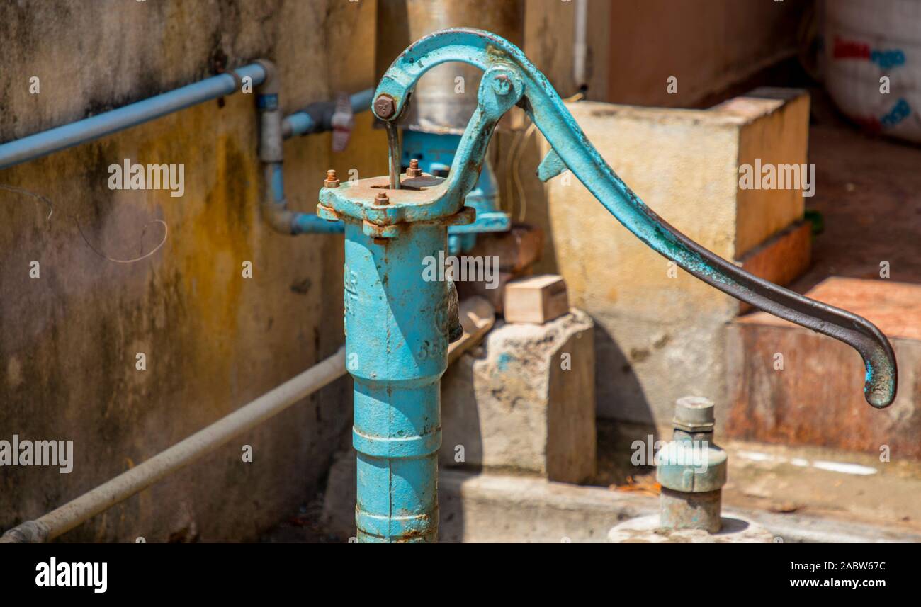 Old Hand water pump background, closeup Stock Photo - Alamy
