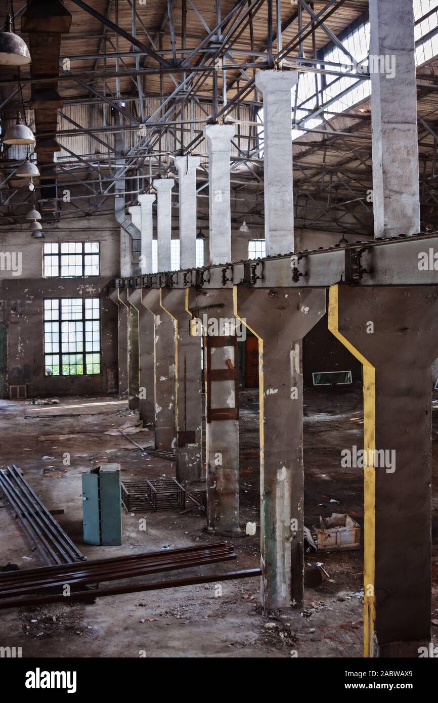 Empty abandoned factory of fabricated metal products manufacturing. Stock Photo