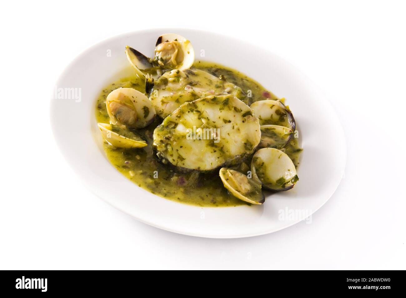 Hake fish and clams with green sauce. Typical spanish recipe Stock