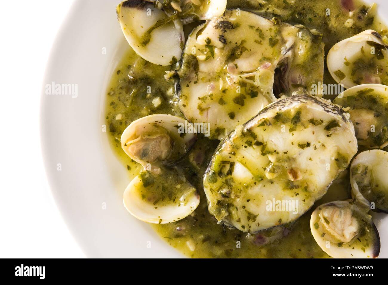 Hake fish and clams with green sauce. Typical spanish recipe. Top view