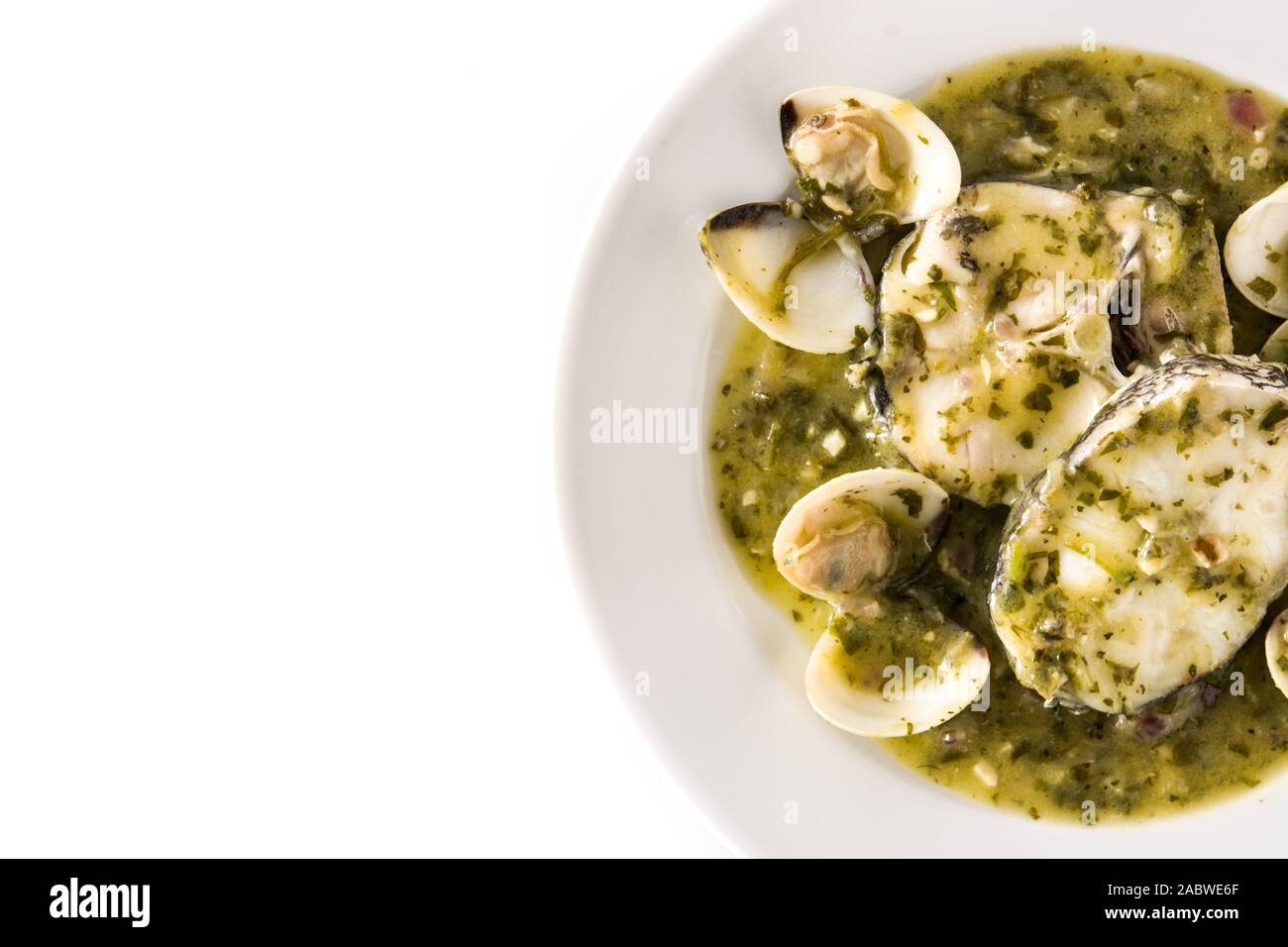 Hake fish and clams with green sauce. Typical spanish recipe. Top view