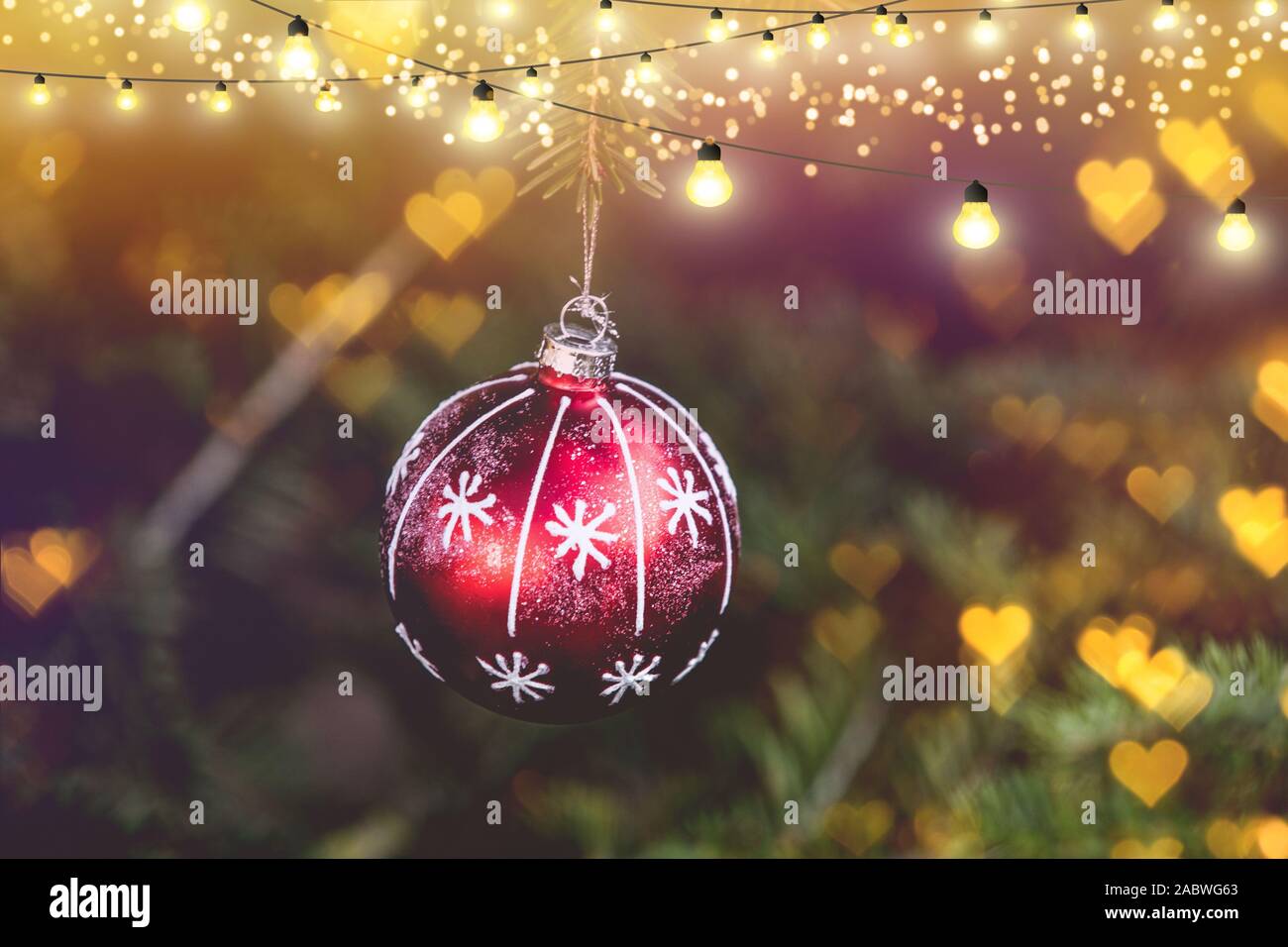 Christmas tree ornaments on fir tree Stock Photo