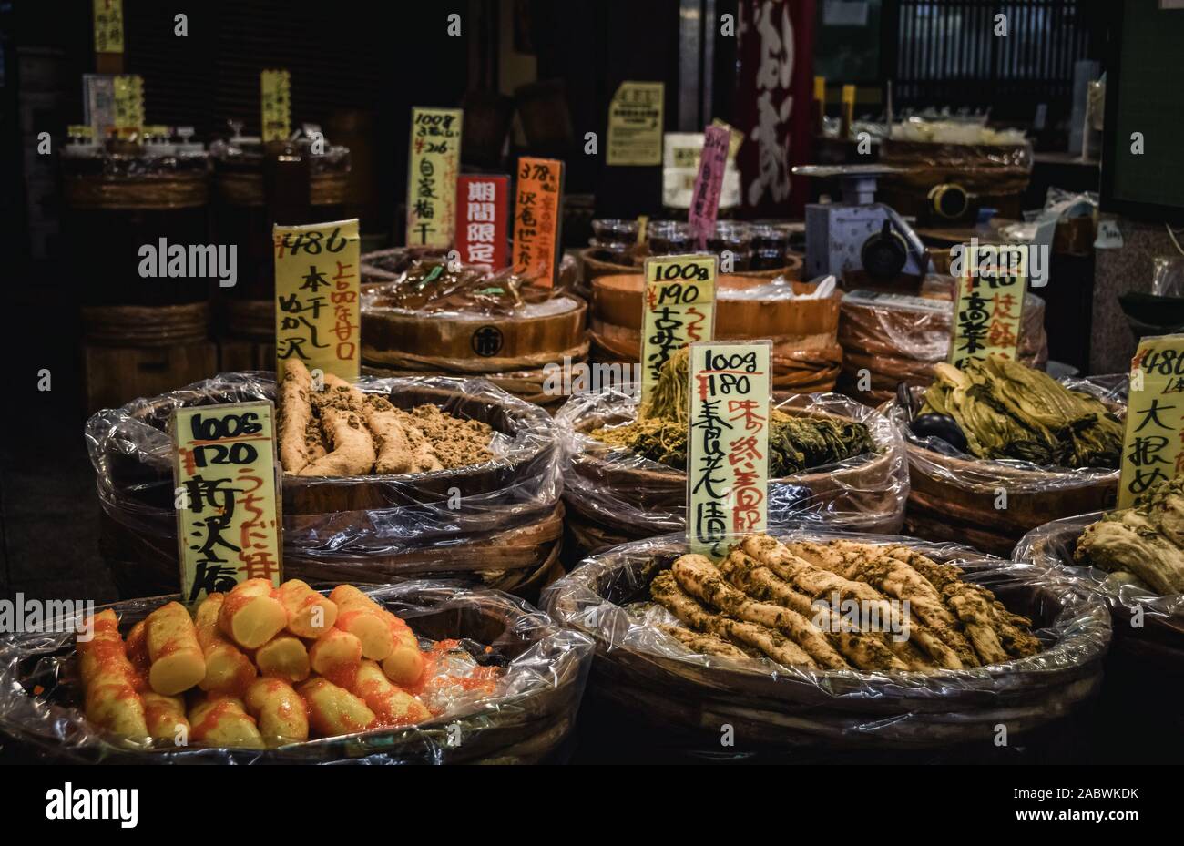Barrels filled with traditional Japanese delicacies at the famous Nishiki Market in downtown Kyoto, Japan. Stock Photo