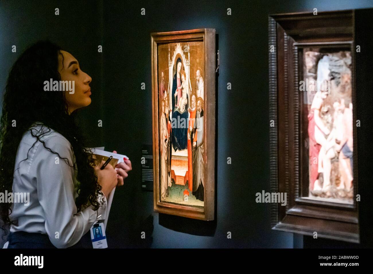 London, UK. 29th Nov, 2019. A handler examins works for damage - Sotheby’s previews its Old Masters Evening sale which takes place on 4 December in London. Credit: Guy Bell/Alamy Live News Stock Photo