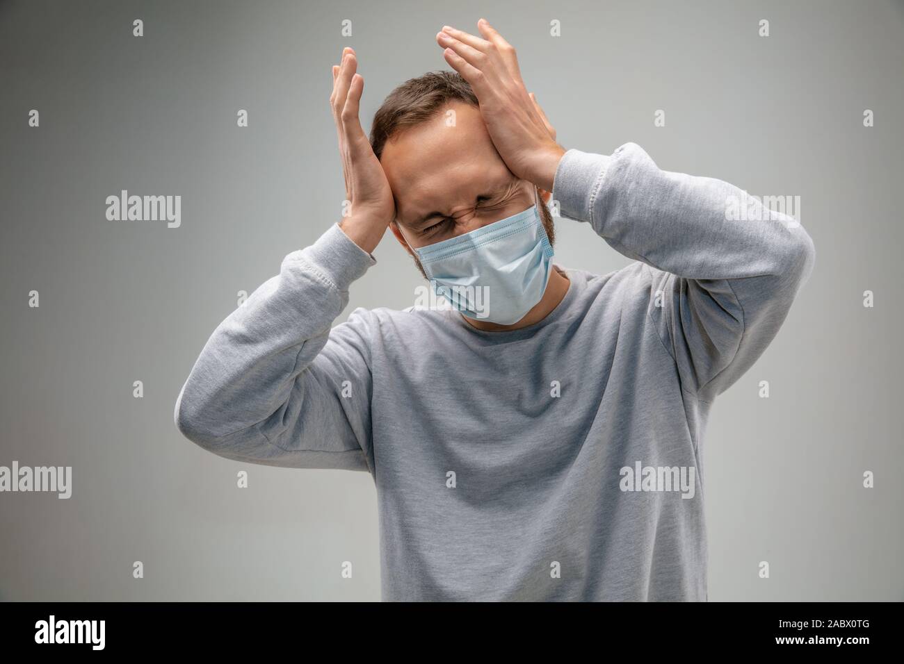 Can't breathe. Caucasian man wearing the respiratory protection mask