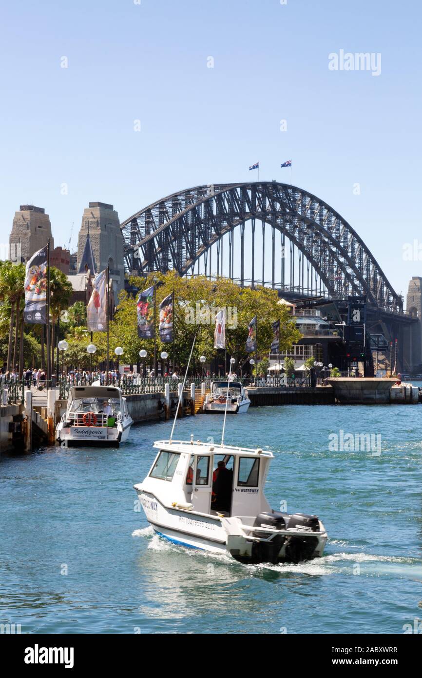 Sydney Harbour Bridge and boats in November daytime; Sydney Harbour, Sydney Australia Stock Photo