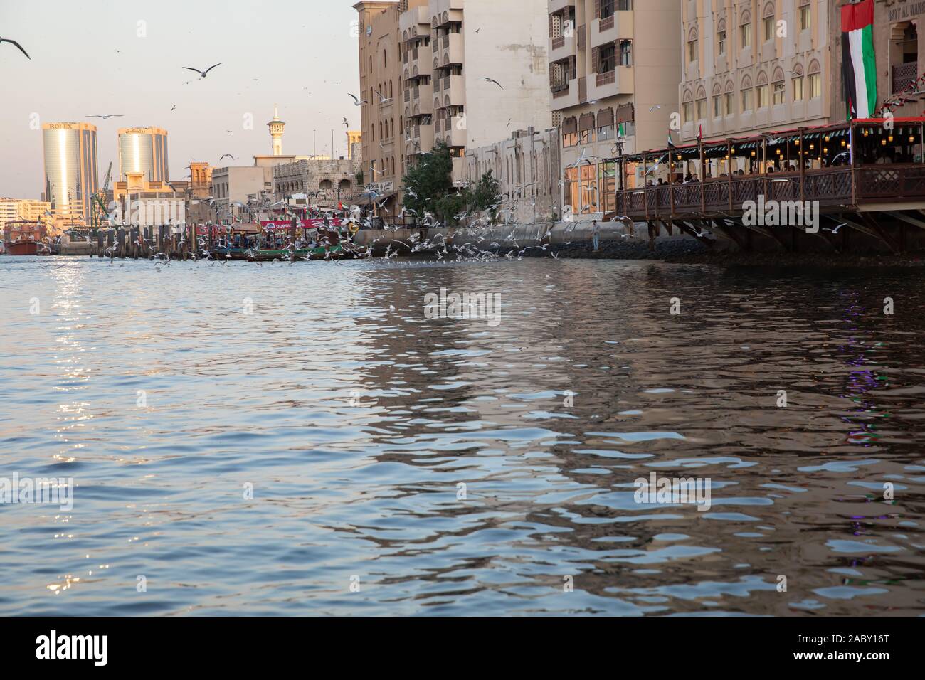 Abras and Dhows on Dubai Creek, UAE Stock Photo