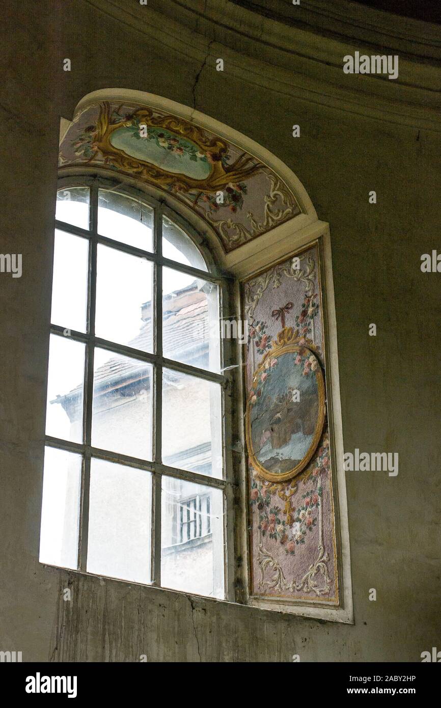 Window polychrome of the chapel in the Sarny Palace built in 1661 in Sarny from the reconstruction of the Renaissance manor, made by the von Götzen fa Stock Photo